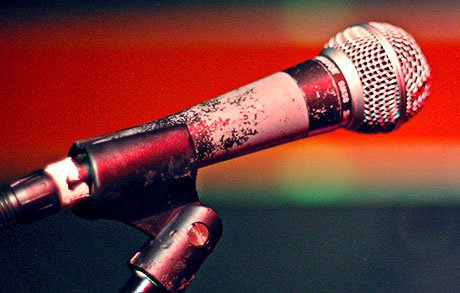 Weathered microphone on a stage